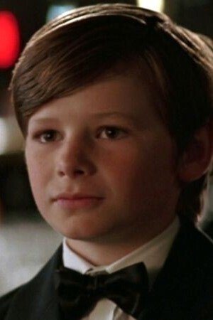 Gus Lewis - Bruce Wayne (Age 8) (archive footage) (uncredited)