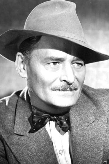 Roman Bohnen - Warden A.J. Barnes