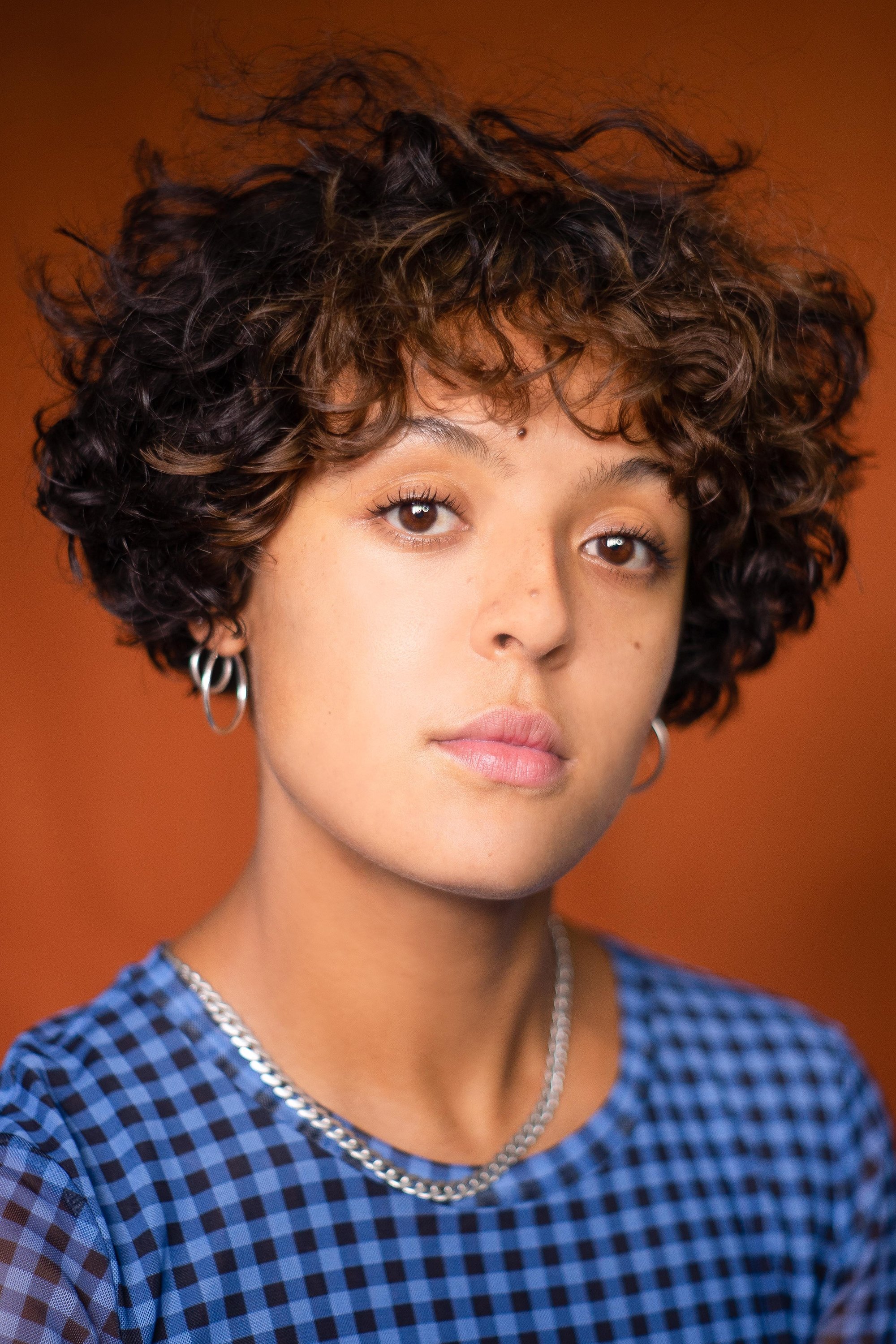 Cora Kirk - Emilia
