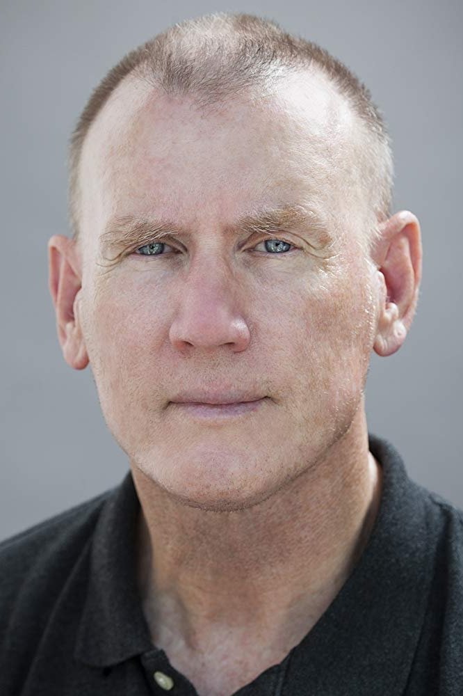 Chris Nelson Norris - Health Club Attendant (uncredited)