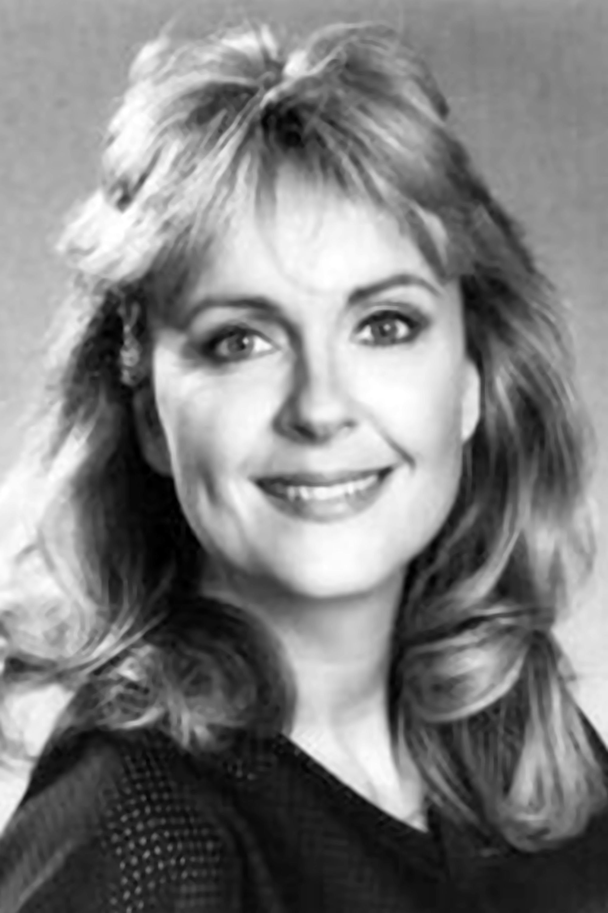 Deborah Harmon - TV Newscaster (uncredited)