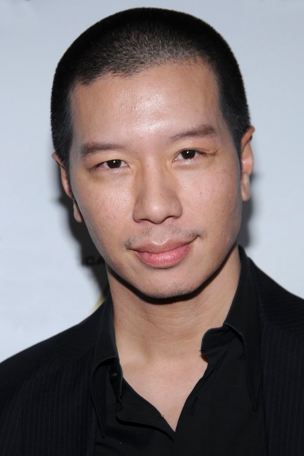 Reggie Lee - Officer Huang