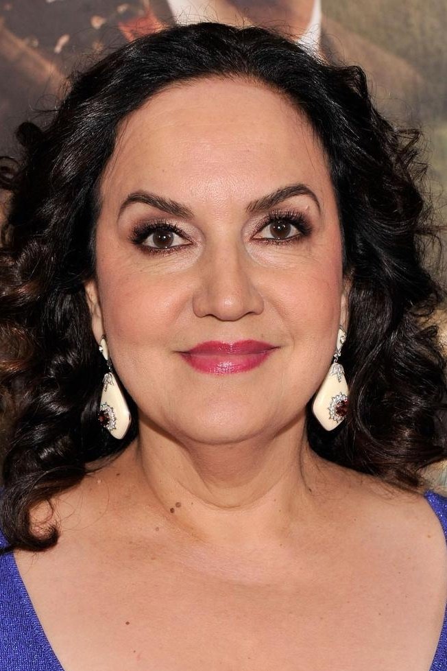 Olga Merediz - Abuela Claudia