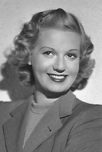 Laura Solari - Hennessy's Secretary
