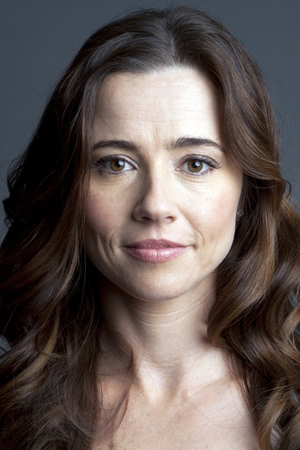 Linda Cardellini - Laura Barton (archive footage)