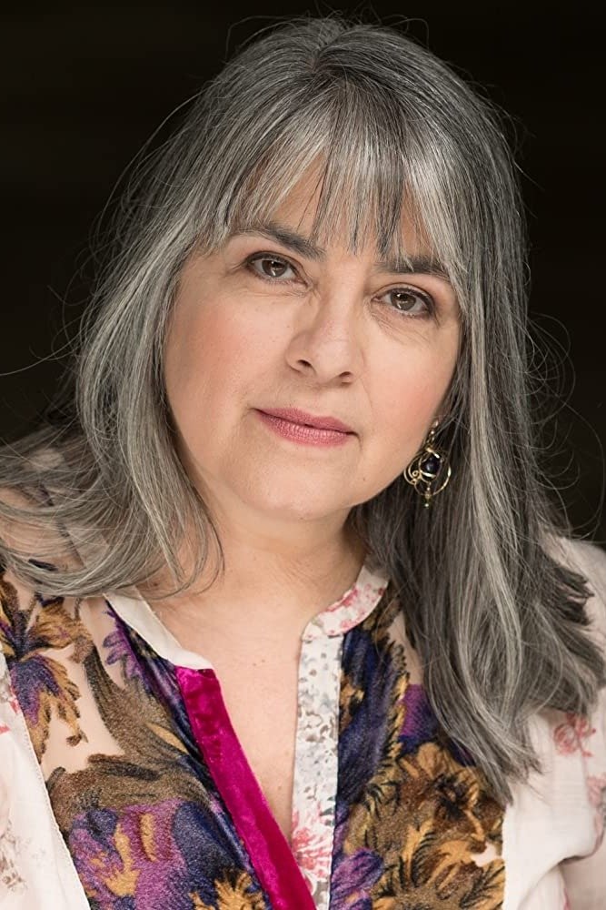 Norma Alvarez - Javier's Wife