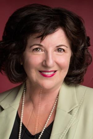 Elaine Victoria Grey - Businesswoman - Pedestrian (uncredited)