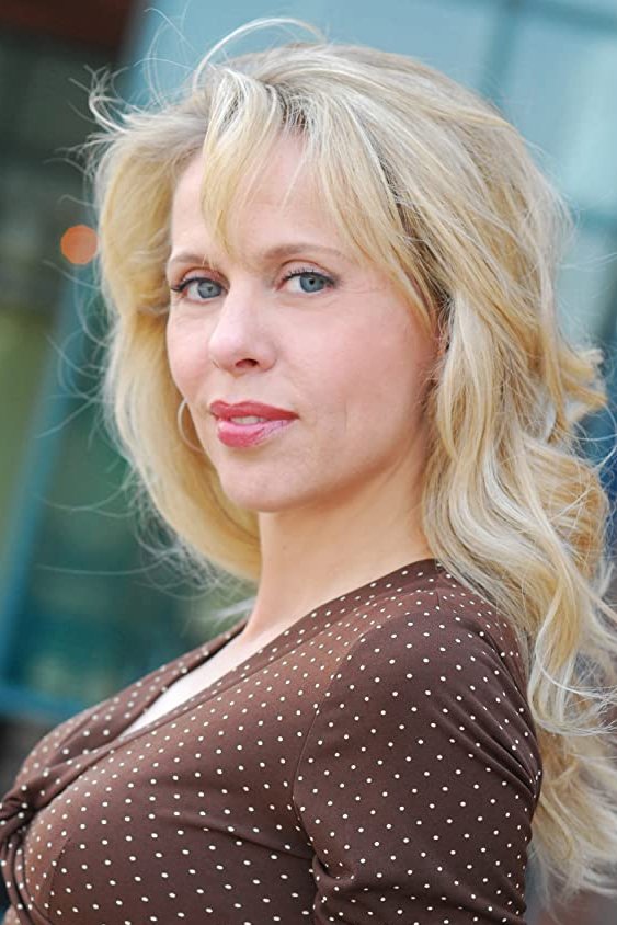 Dina Morrone - TV Voice Over Announcer (voice) (uncredited)