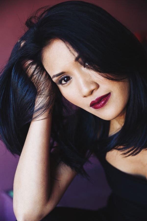 Marissa Carpio - Reporter with Big Hair (uncredited)