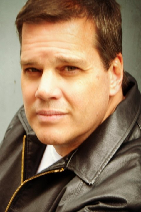 Michael Garvey - Reporter (uncredited)