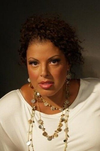 Melique Berger - Sarah Charles (voice)