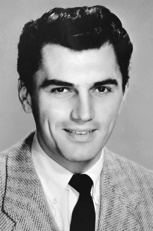 Edmund Purdom - British Radio Announcer (voice) (uncredited)