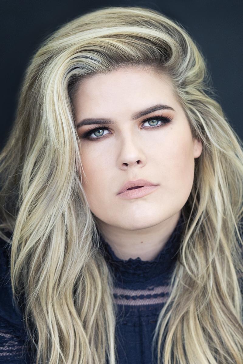Erica Lindbeck - Greeter (voice) / Farmer (voice)