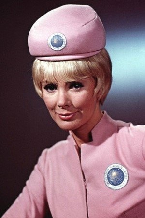 Maggie London - Hostess in Elevator (uncredited)