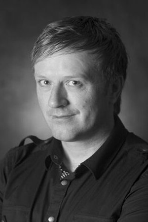 Grant Crookes - New Years Eve Party Goer (uncredited)