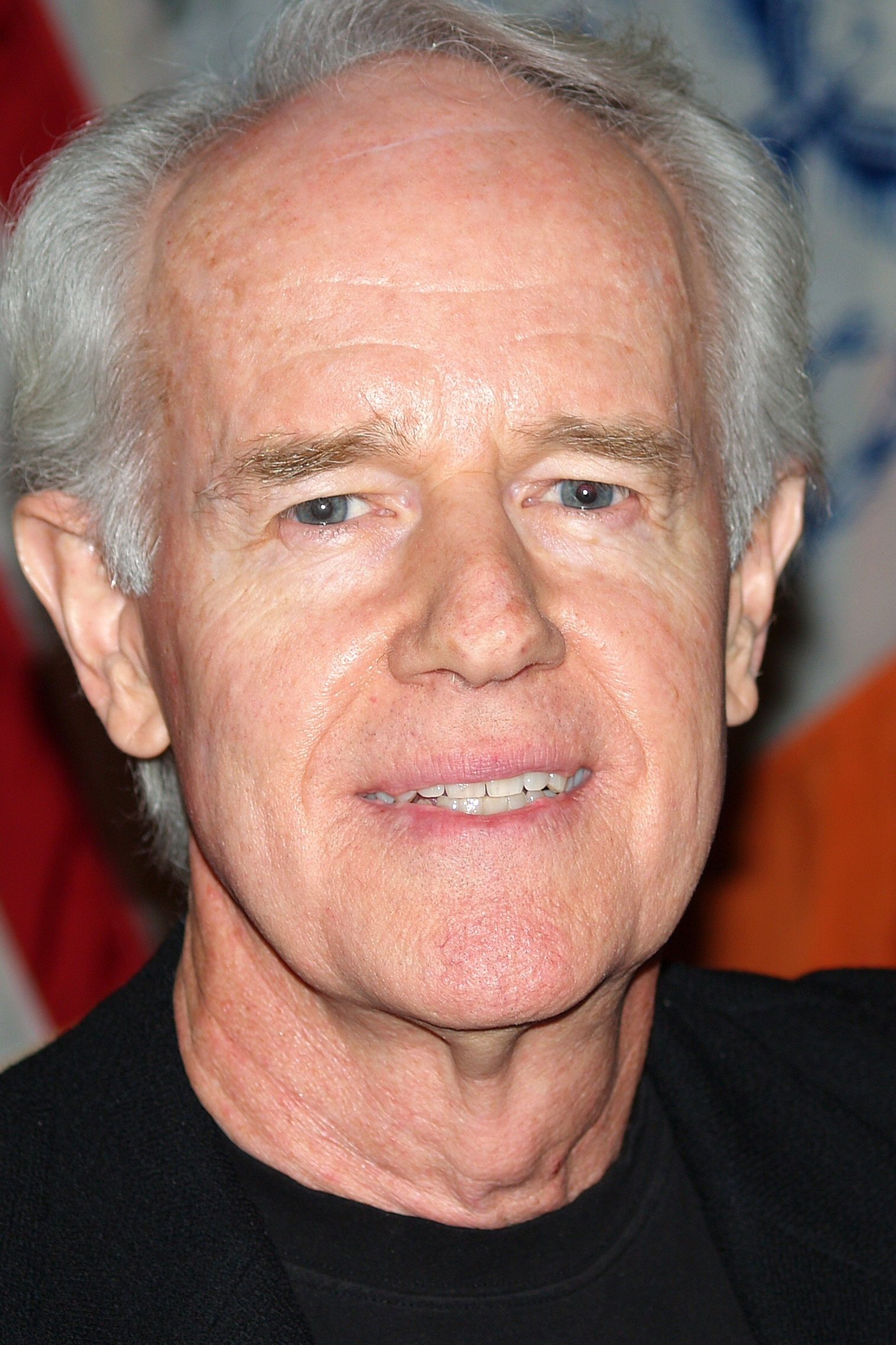 Mike Farrell - Hotel Lobby Bellhop (uncredited)