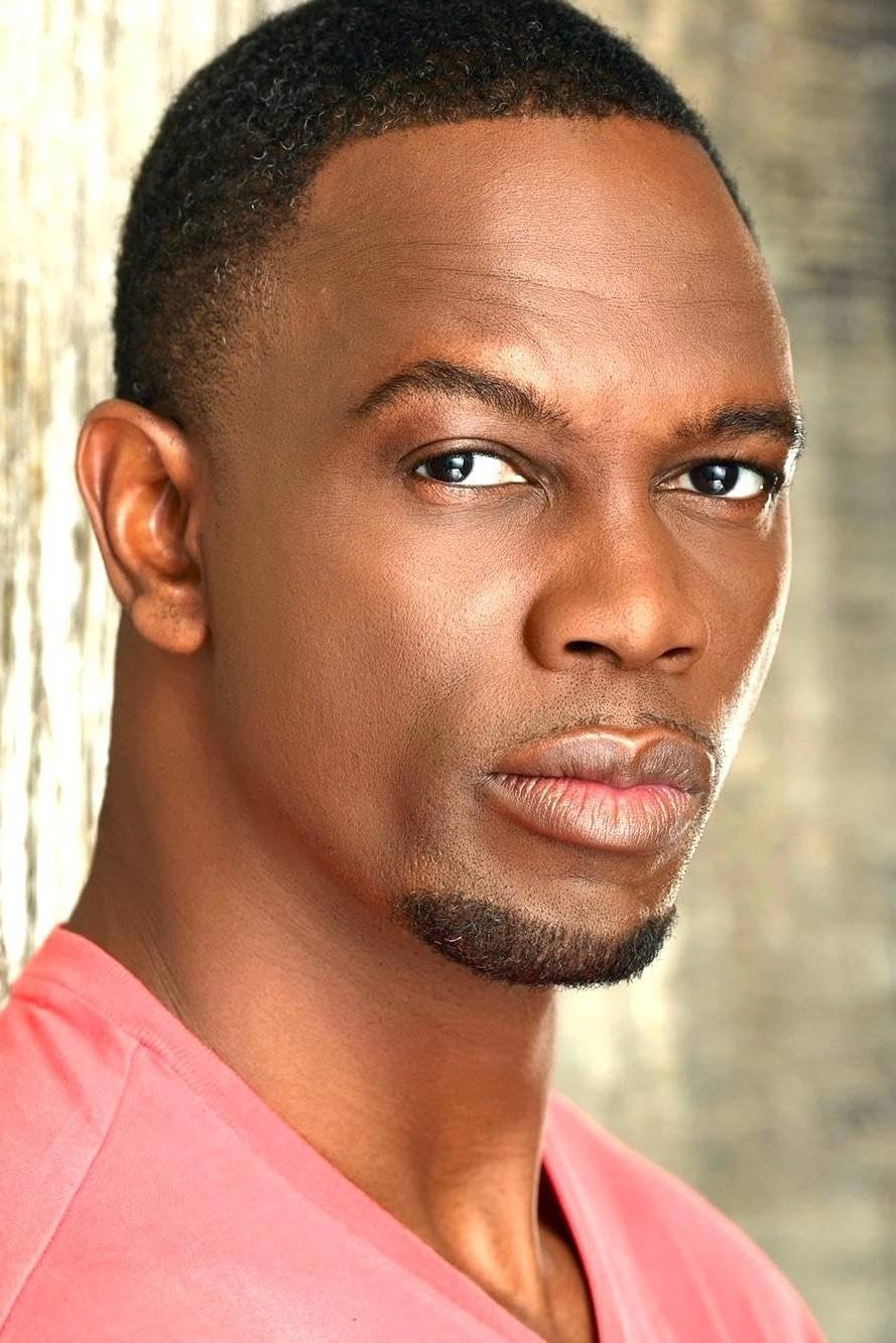 Newton Mayenge - Car Driver (uncredited)