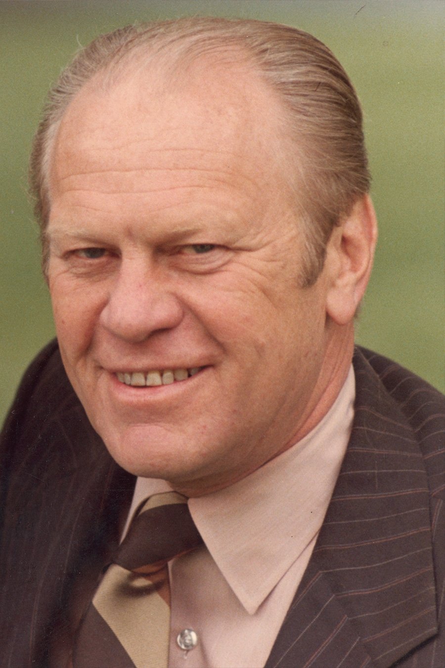 Gerald Ford - Self - Assassination Attempt (archive footage) (uncredited)