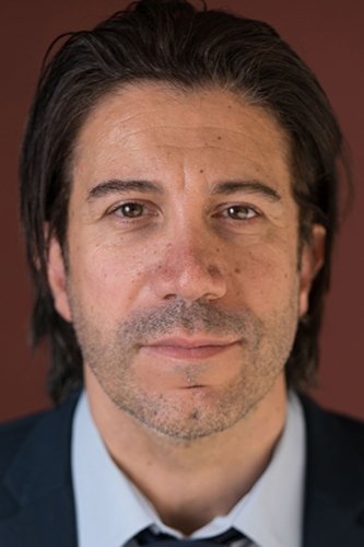 Gianni Capaldi - Officer Quade
