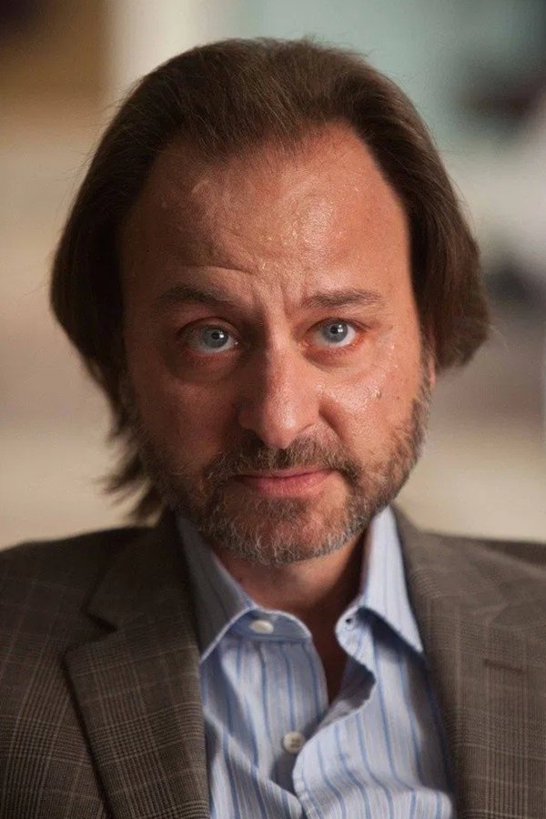 Fisher Stevens - M. Robin