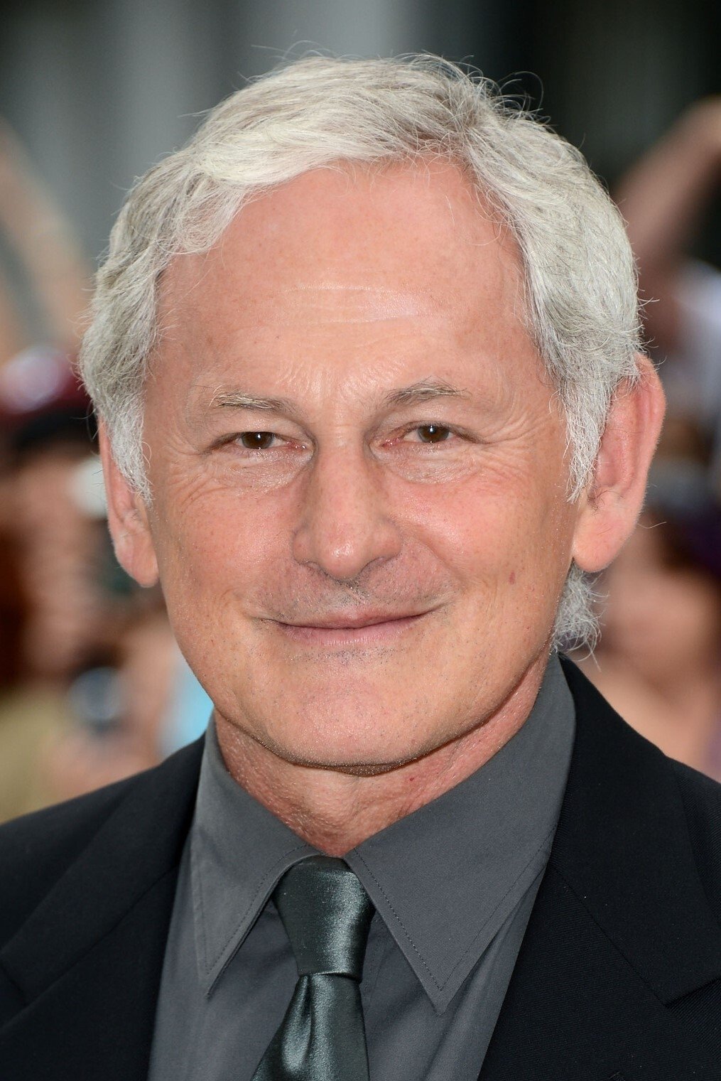 Victor Garber - Assistant Bank Manager (uncredited)